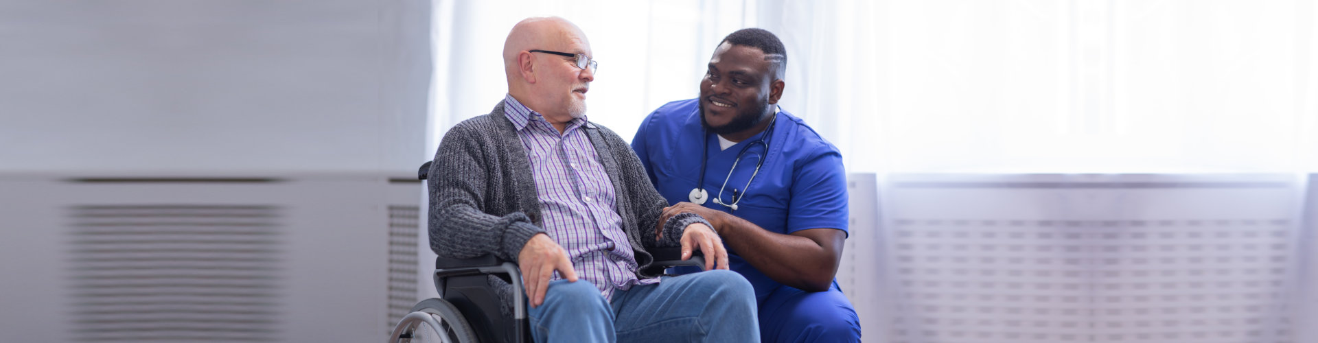 senior having conversation with the caregiver